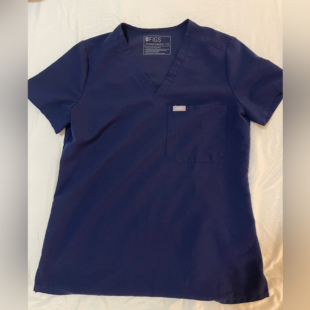 Lightly worn XS navy blue scrub top